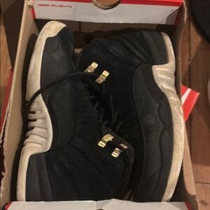 Black and White Jordan retro 12 Sneakers with Gold Accents